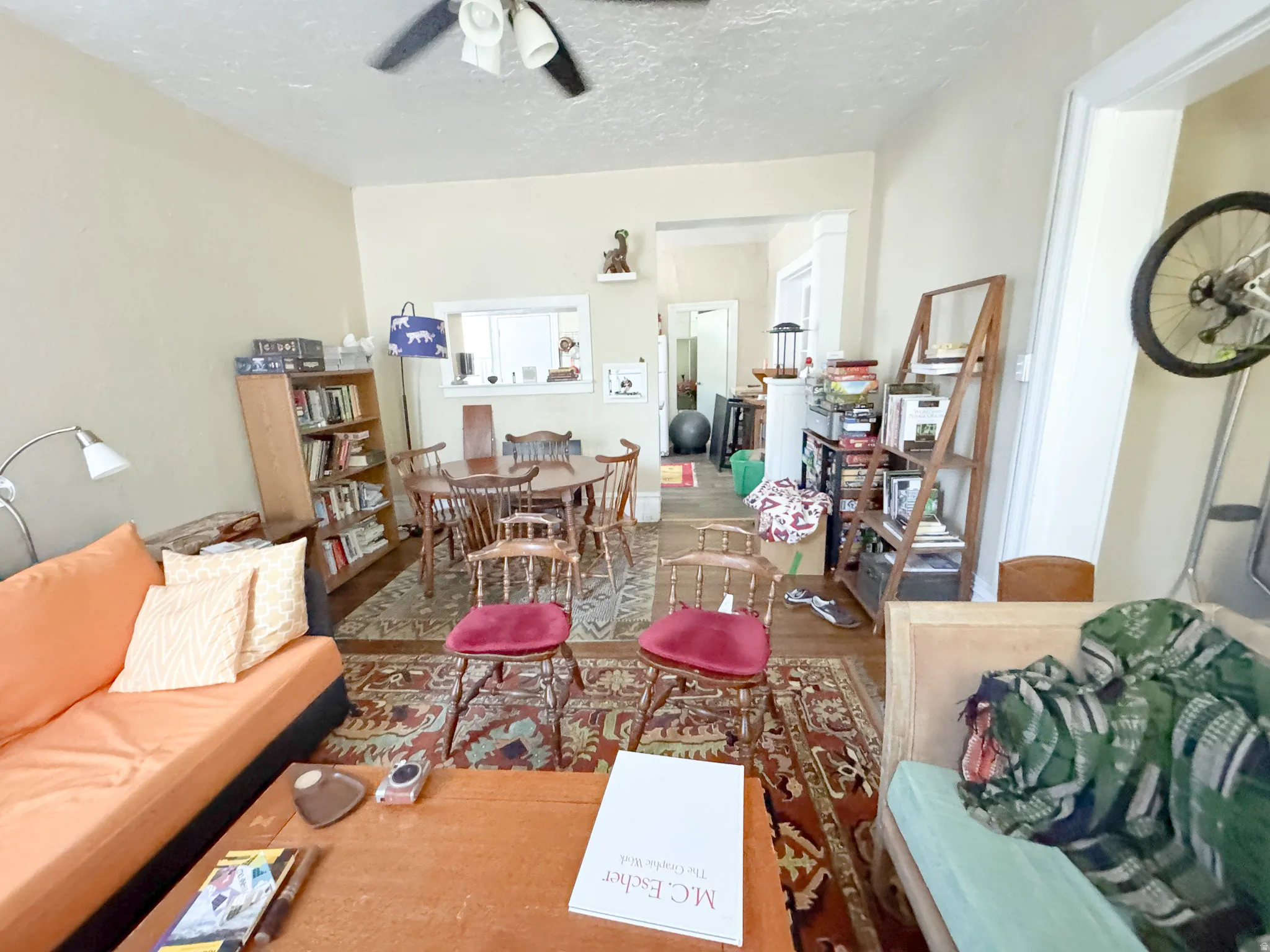 Interior space with light-colored walls and wood-finish flooring