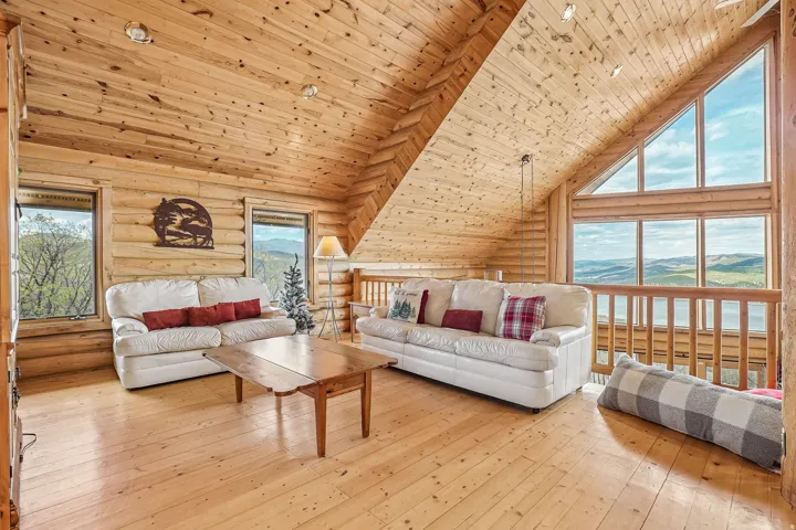 Vaulted wood-paneled ceilings with exposed beams