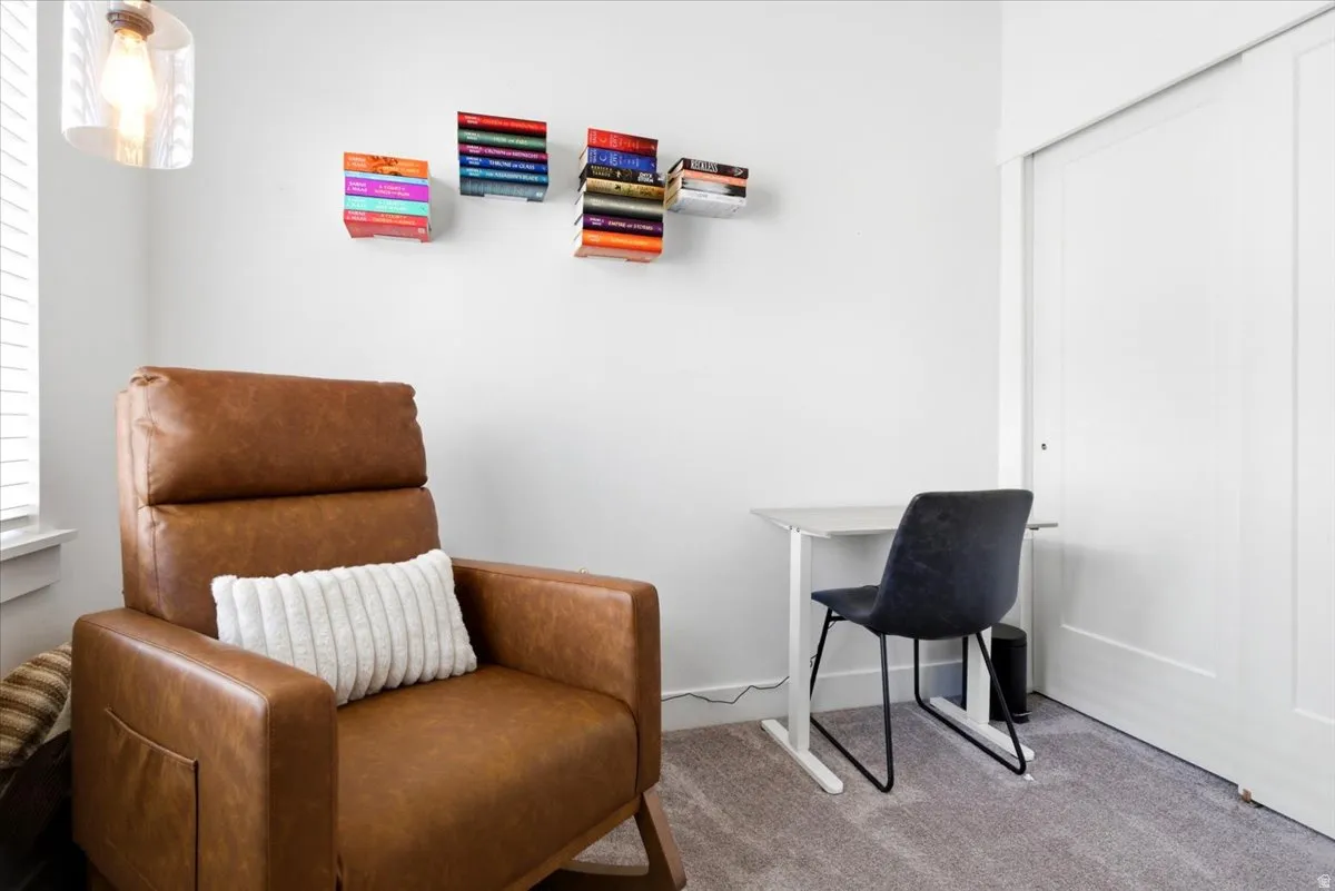 Dedicated room featuring carpeted flooring and white walls