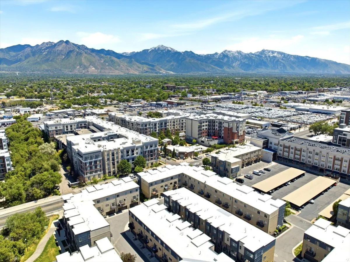 Aerial perspective showcasing multi-story residential buildings and townhomes