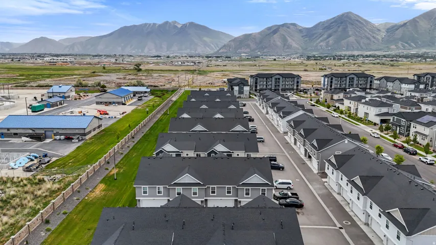 Townhome community featuring modern architectural design and abundant parking