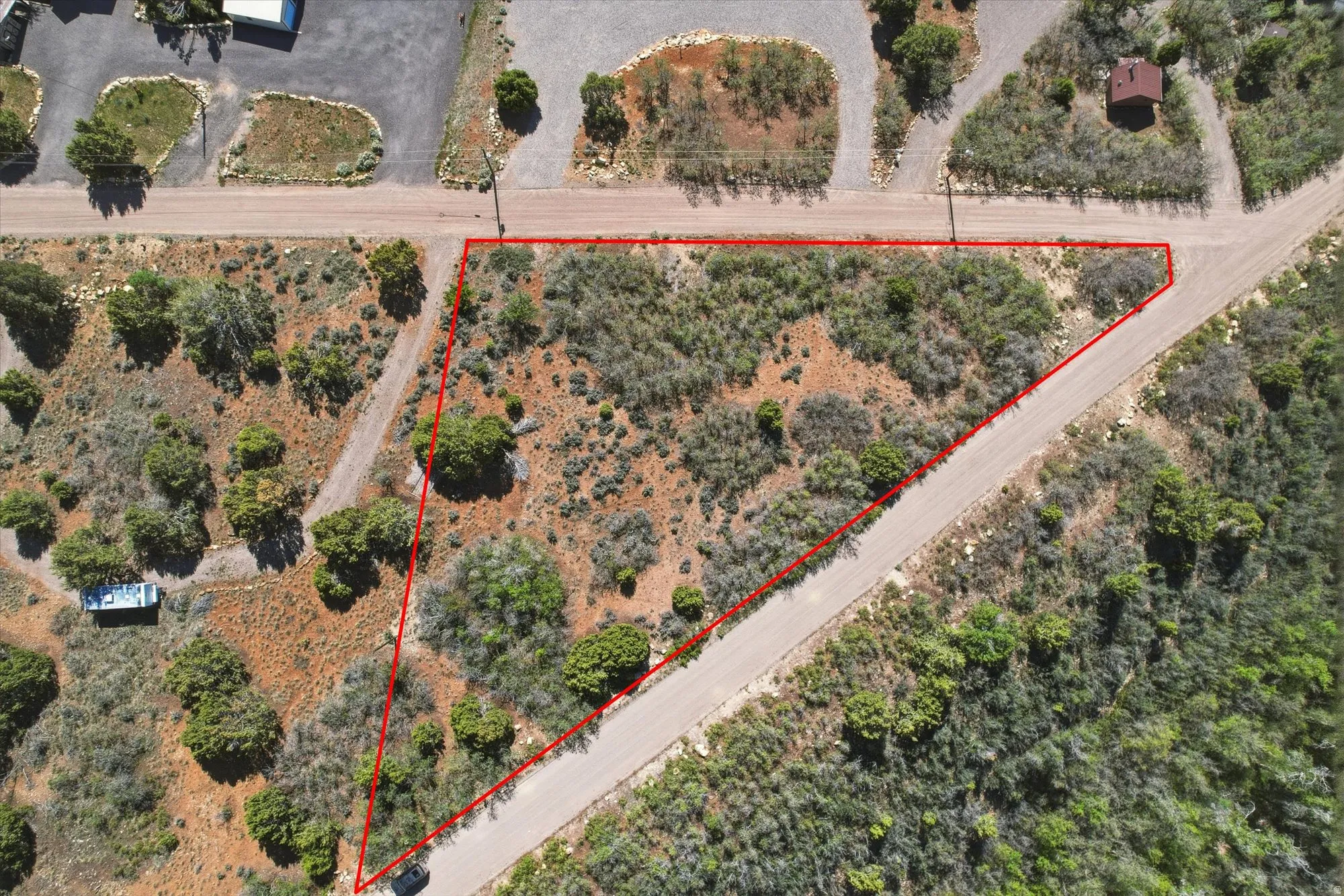 Generous parcel featuring natural vegetation and multiple road frontages
