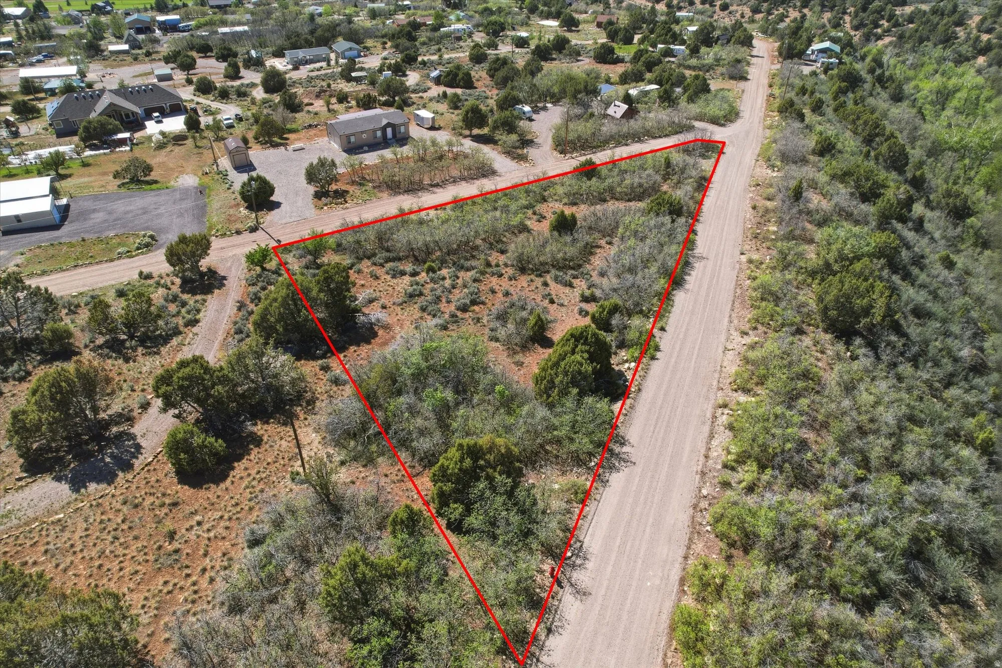 Expansive triangular parcel featuring natural desert vegetation