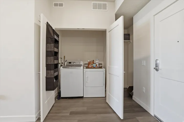 Dedicated laundry area featuring a washer and dryer
