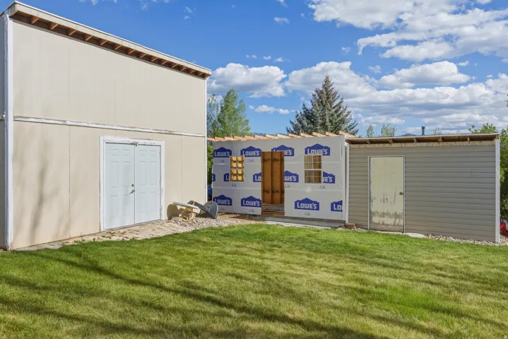 Multiple large storage sheds.