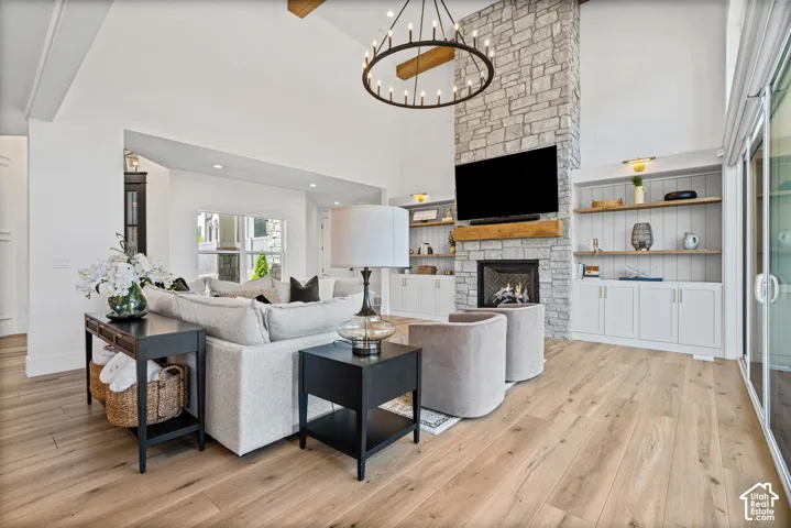Vaulted ceiling great room with wood-finish flooring