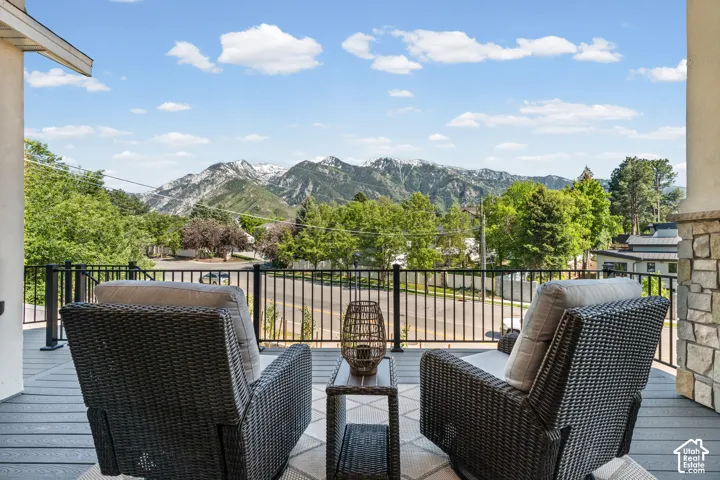 Expansive outdoor deck featuring composite flooring and a metal railing system