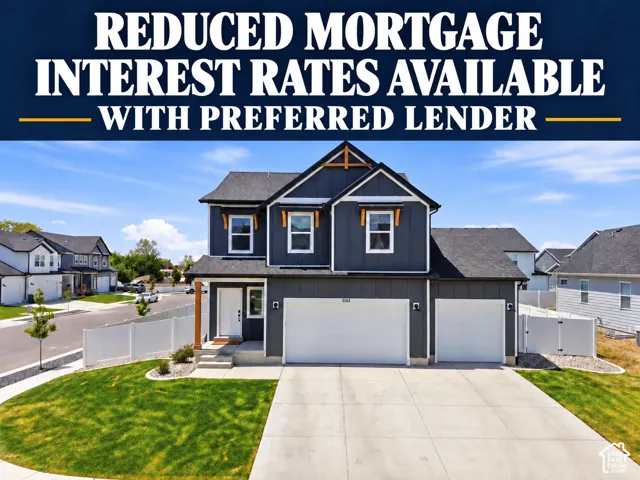 Modern-style two-story residence with dark siding, white trim, and a prominent front entrance