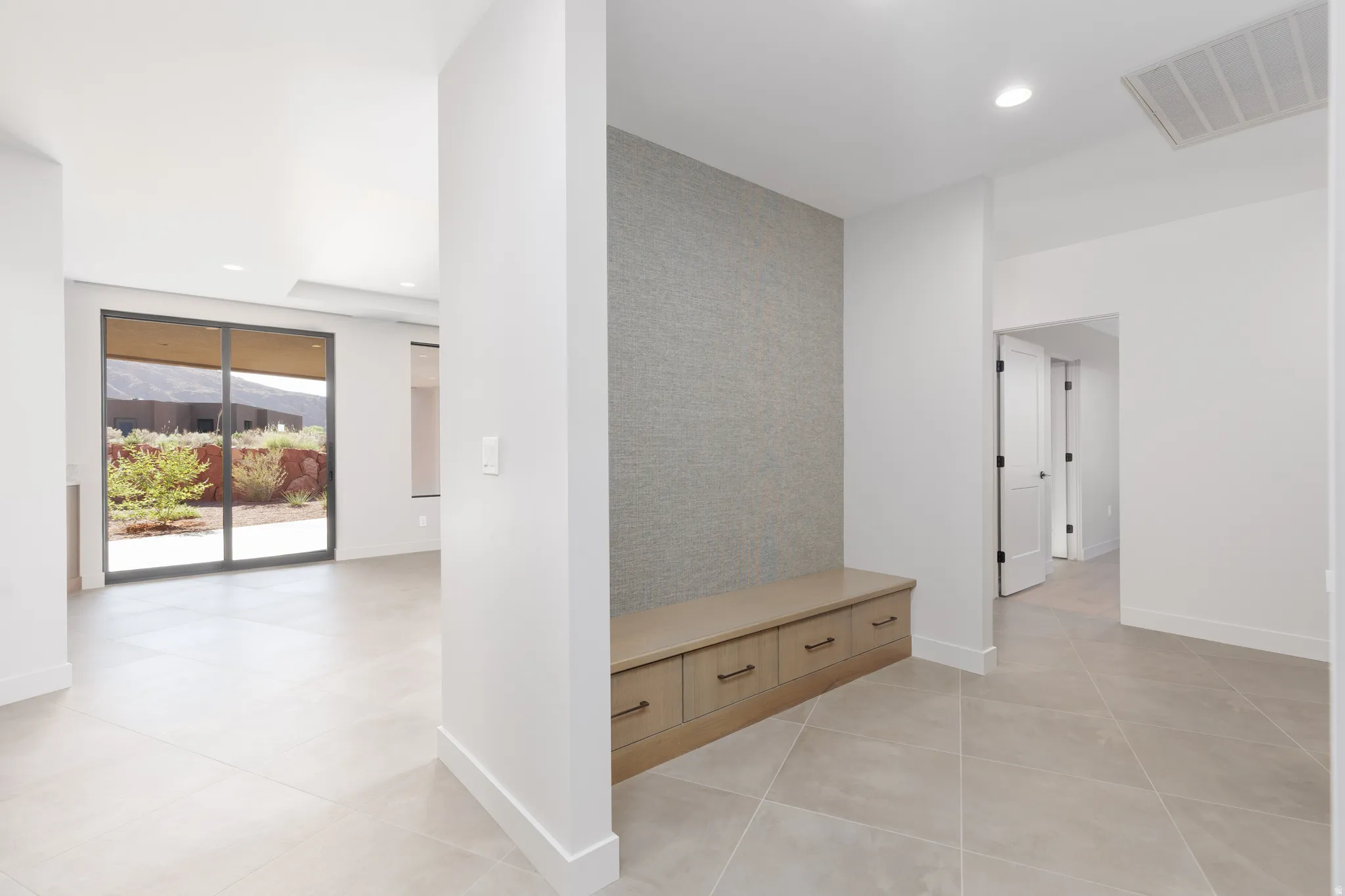 Second family room leads to 2 of the guest bedrooms.