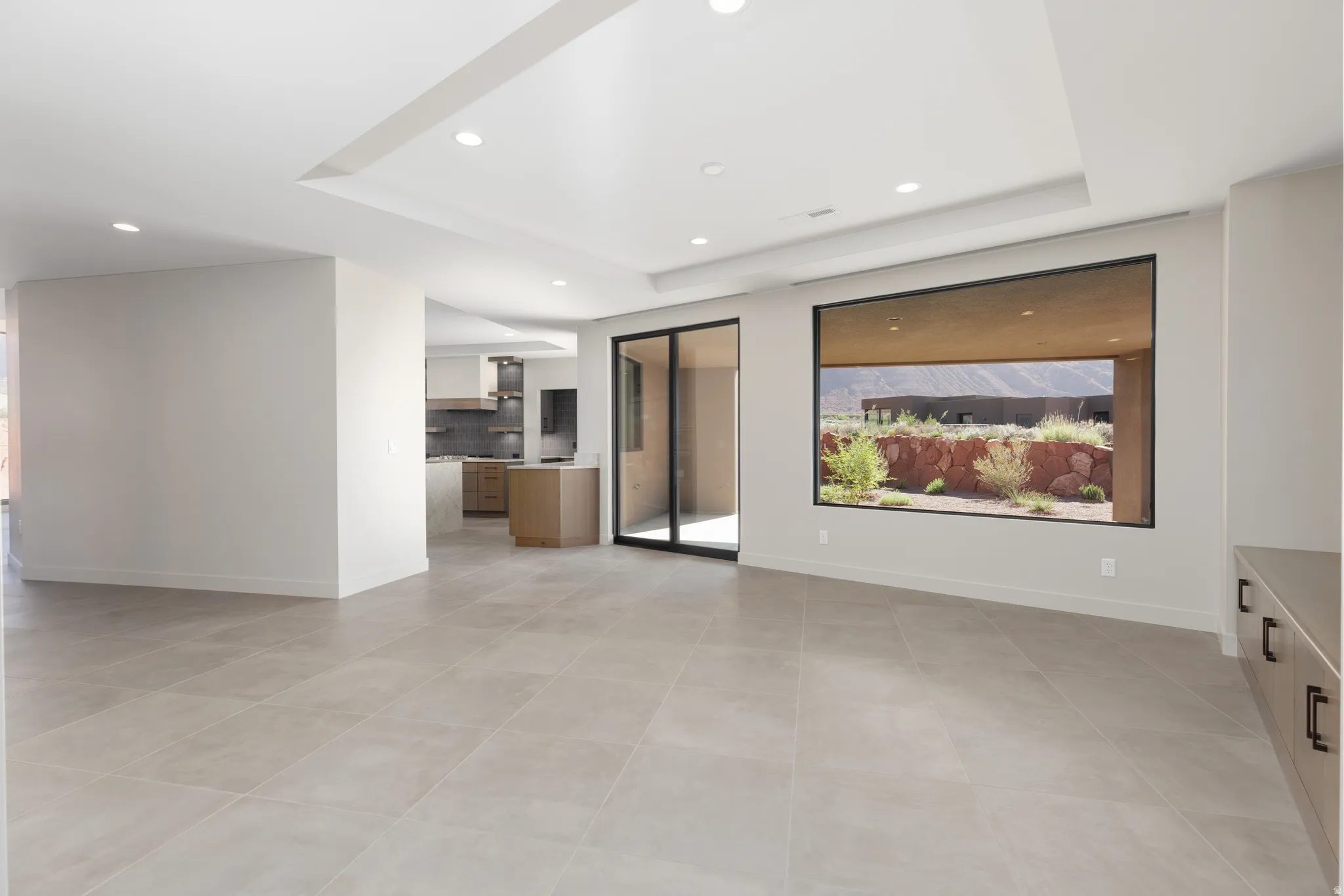 Second family room adjacent to the kitchen. The perfect layout for hosting large gatherings.