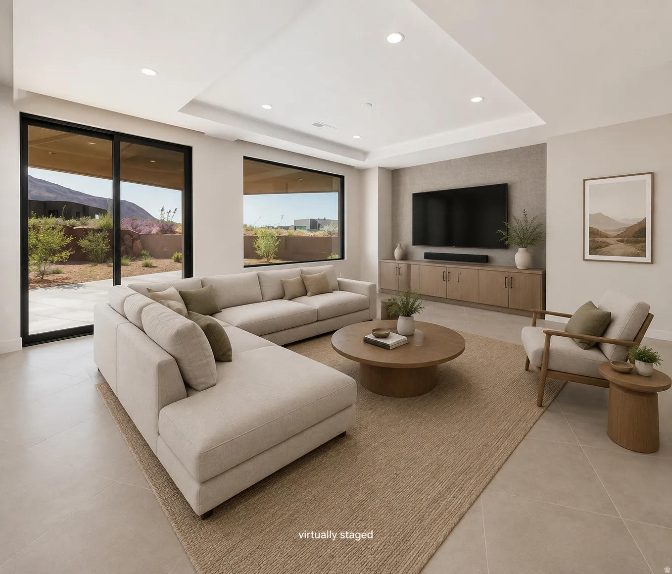 Second family room featuring a wall of windows that opens onto the large covered patio.