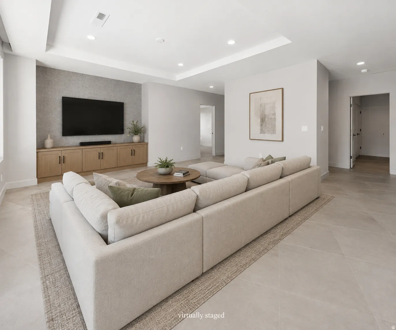 Second family room leads to 2 of the guest bedrooms.