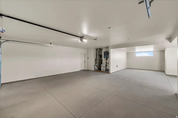 Oversized 3 car tandem garage. Plenty of space for all you toys and tools.