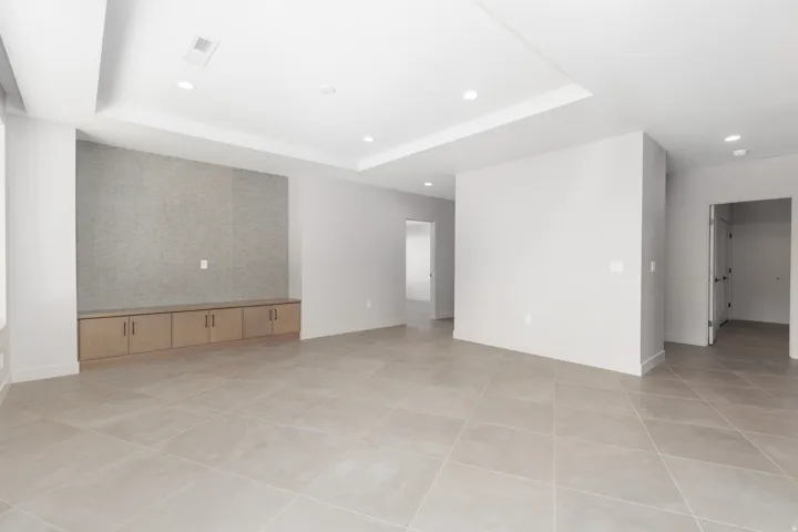 Second family room leads to 2 of the guest bedrooms.