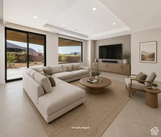 Second family room featuring a wall of windows that opens onto the large covered patio.