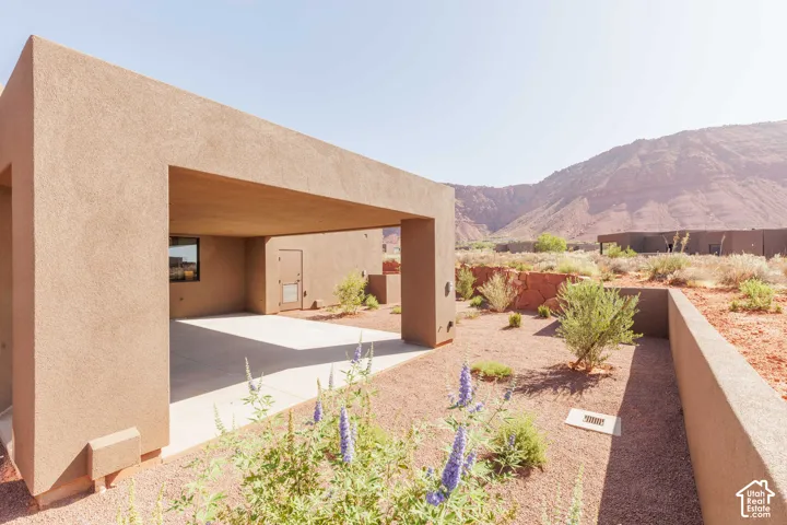Backyard patio is pre-plumed for a fire pit, outdoor kitchen area and a hot tub.