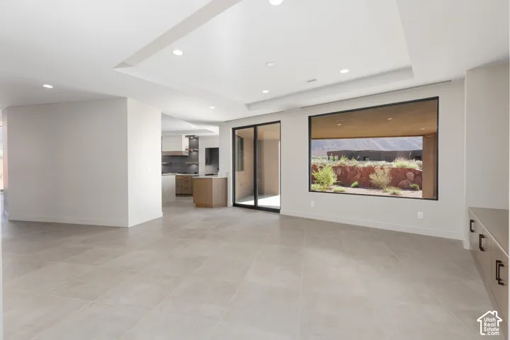 Second family room adjacent to the kitchen. The perfect layout for hosting large gatherings.