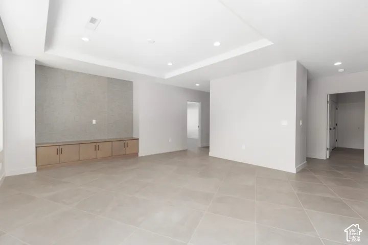 Second family room leads to 2 of the guest bedrooms.