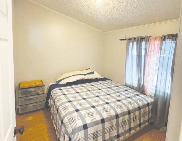 Hardwood-style flooring throughout