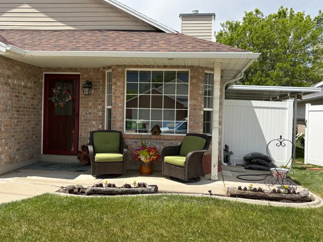 Brick facade home featuring a prominent bay window