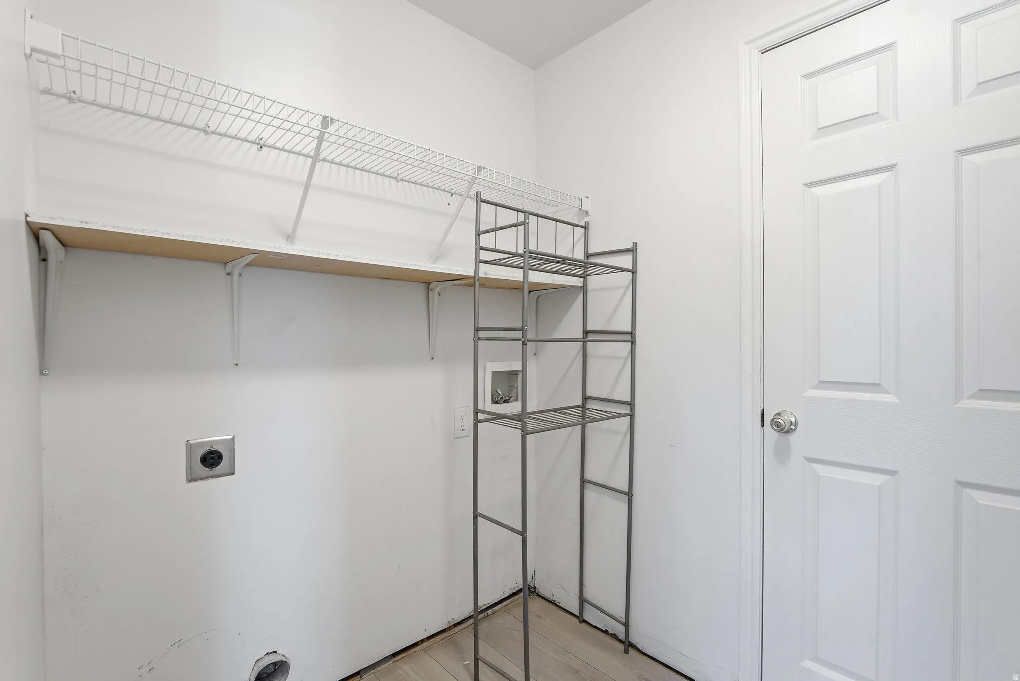 Laundry Room with large storage room