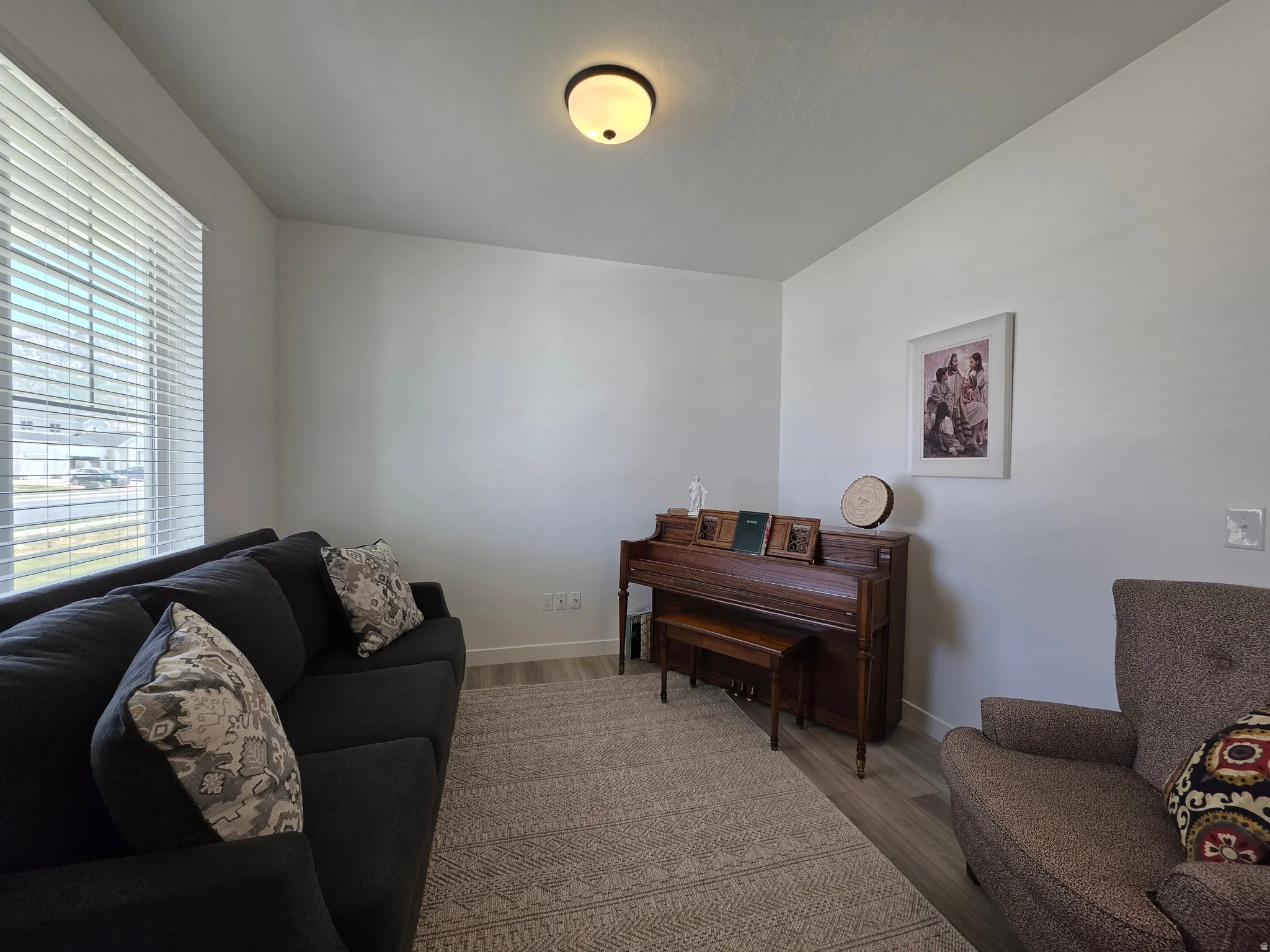 Neutral wall finishes complimenting wood-finish flooring