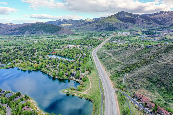 Aerial perspective showcasing a residential area with varied topography