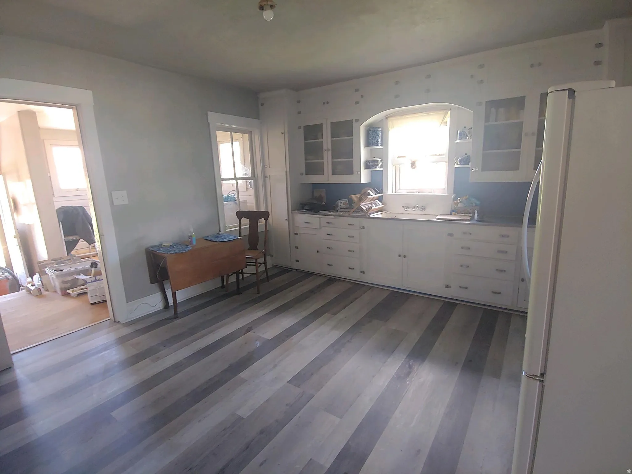 Original Cabinets, Open Kitchen and Newer Flooring