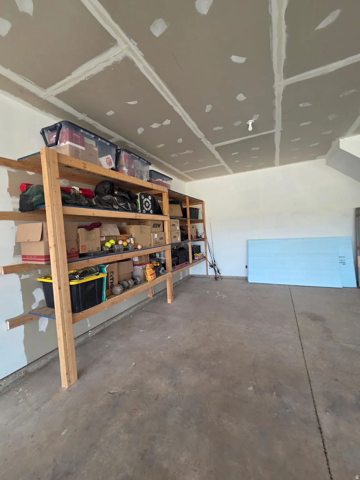 Two-story detached 6 car garage with spacious upstairs!
