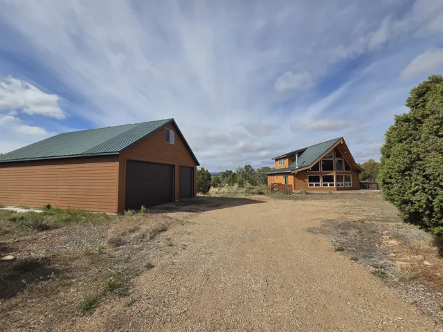 Beautiful Cabin on 5 Acres with 6 car garage!!