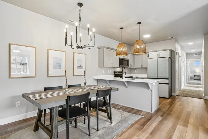 Open-concept living space featuring wood-finish flooring