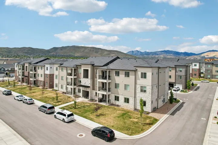 Multi-story residential buildings featuring contemporary architecture with stone and siding facades