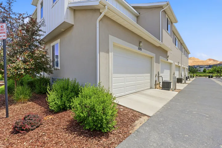 Exterior entrance to 2 car garage.