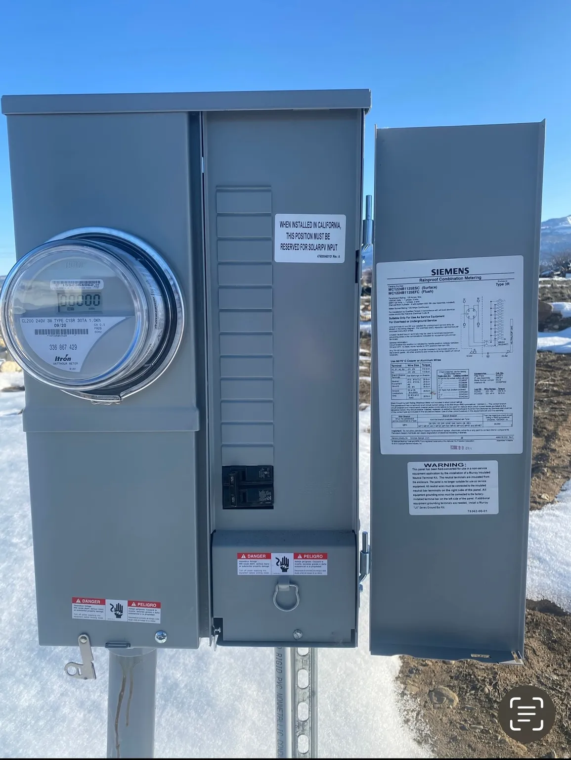 Exterior electrical panel with an integrated utility meter