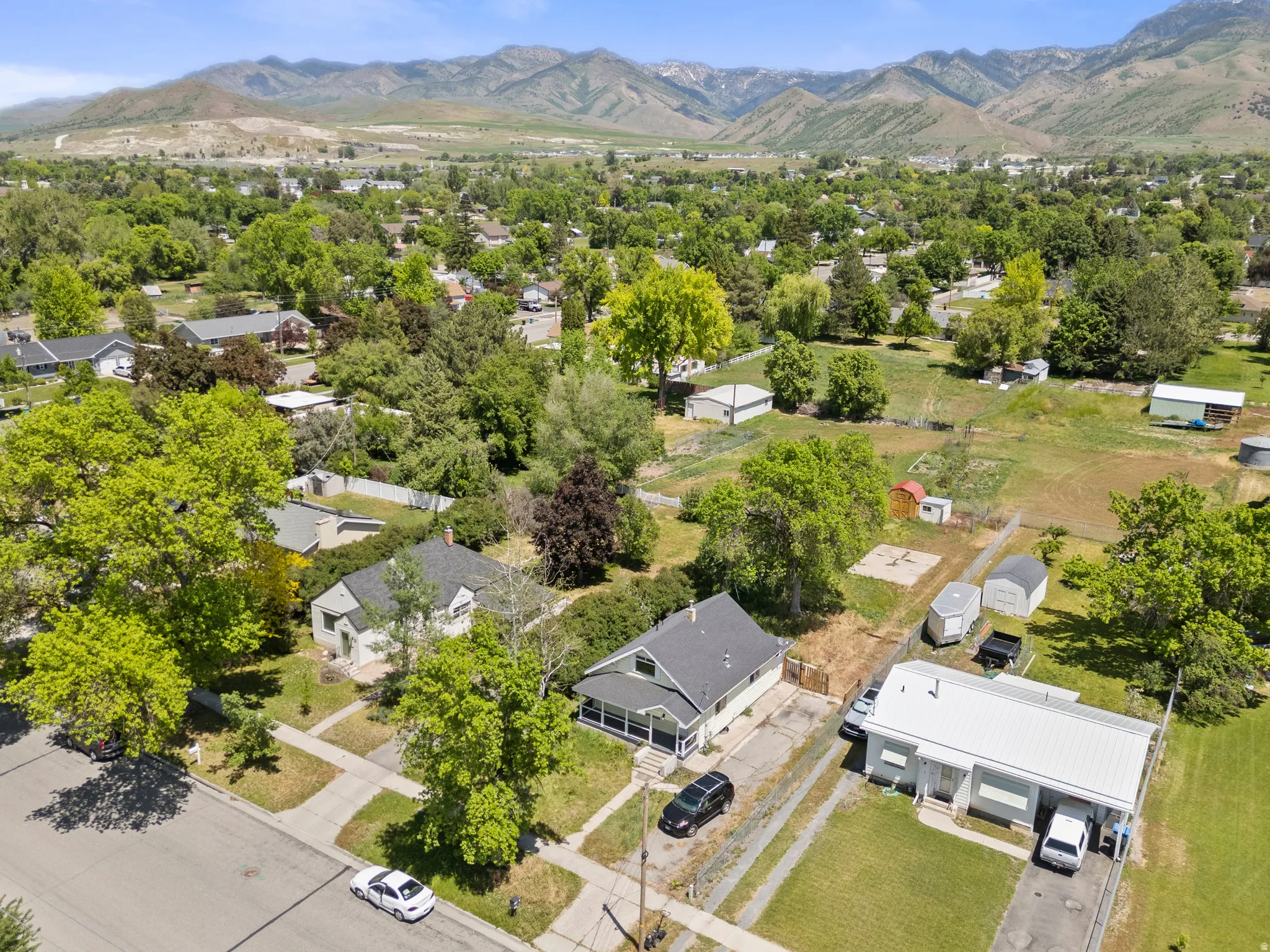 Faces west. Established neighborhood.  Firestation to the south and across the street.