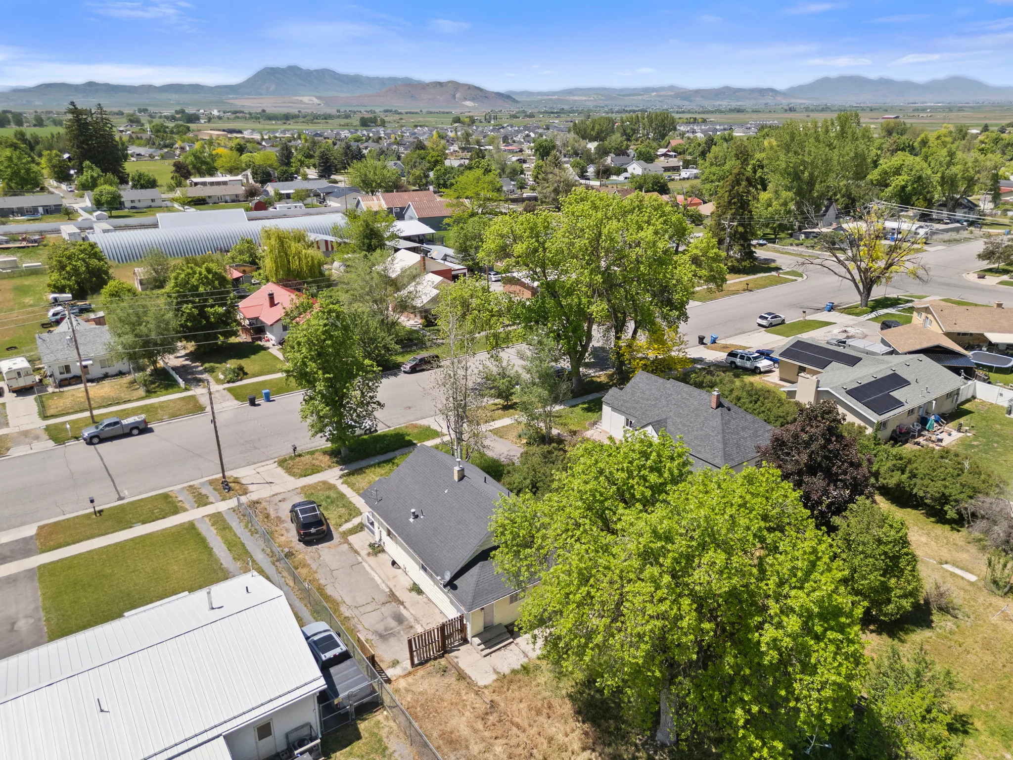Aerial perspective showcasing residential properties within a neighborhood setting
