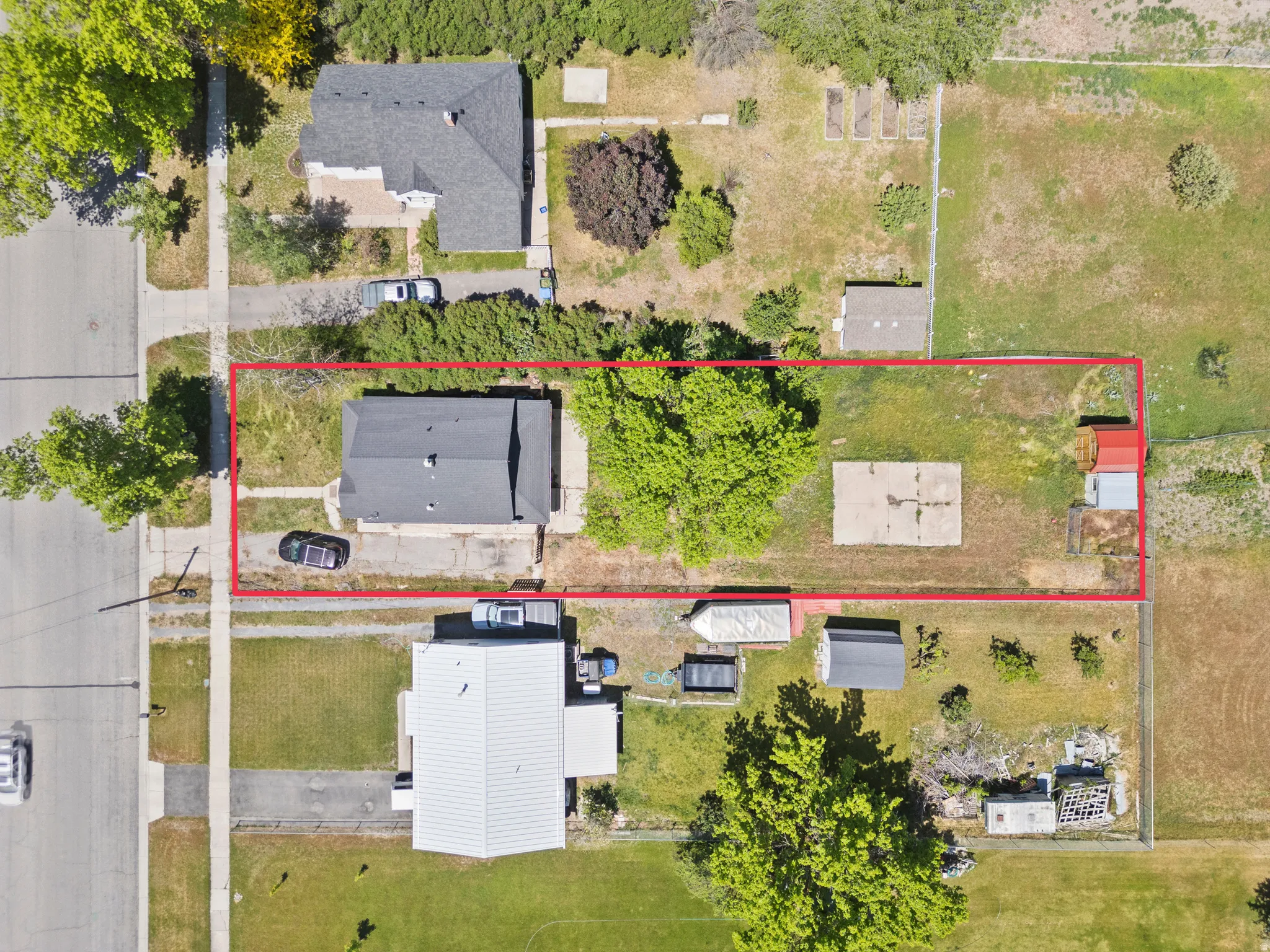 .29 of a reg. lot: 59 x 215 x 59.  Faces west. Dedicated garden area was just to the north of the red roof shed.