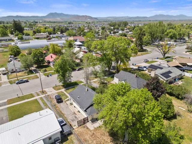 Aerial perspective showcasing residential properties within a neighborhood setting
