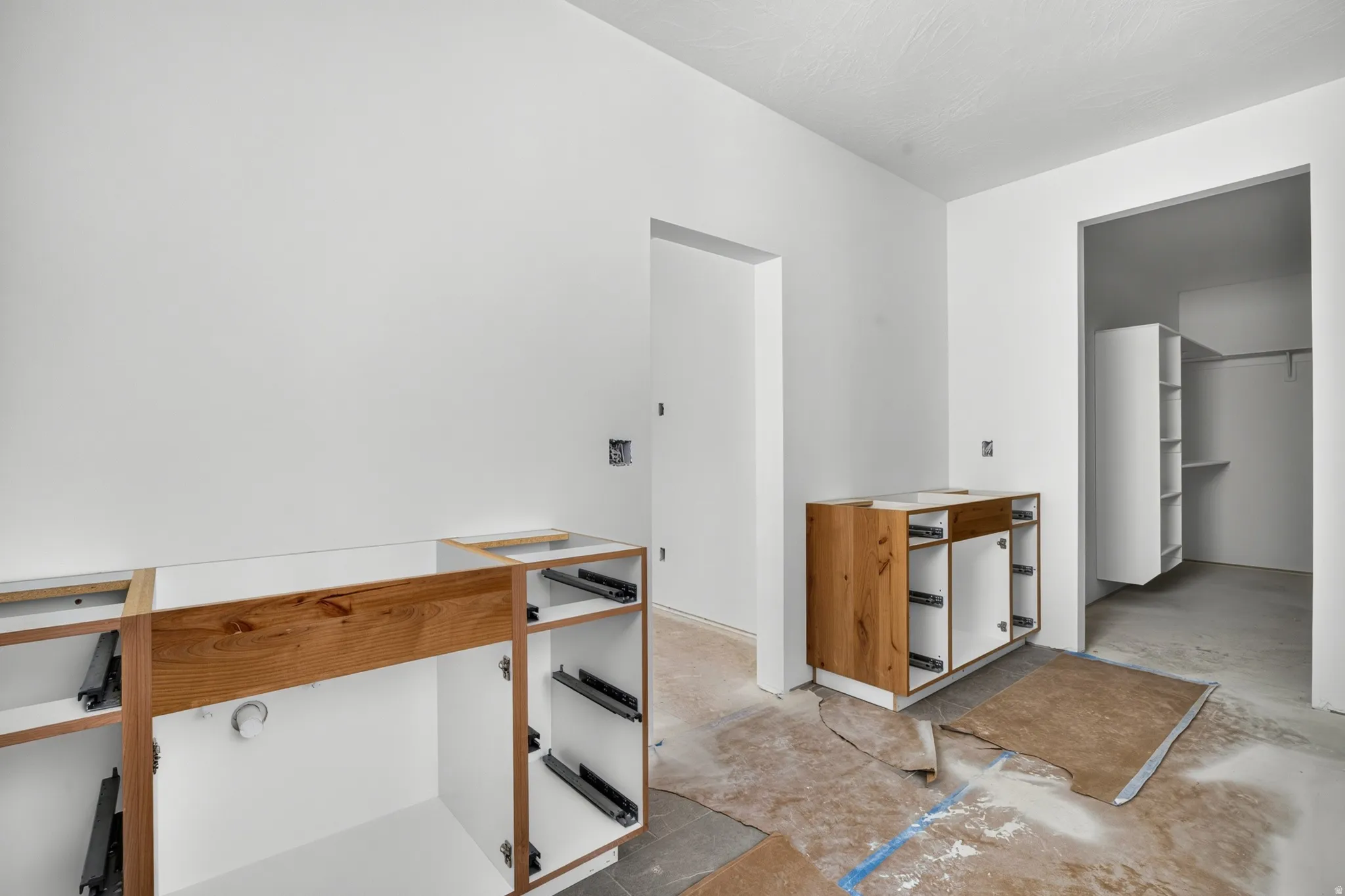 Built-in cabinetry with wood-finish drawer fronts