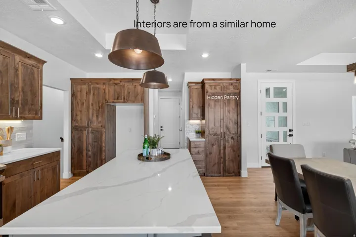Interiors are from a similar home