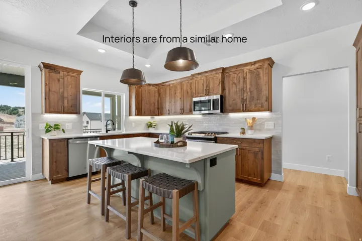 Interiors are from a similar home