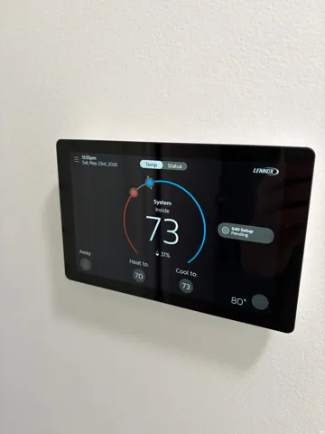 Modern smart thermostat with a digital display