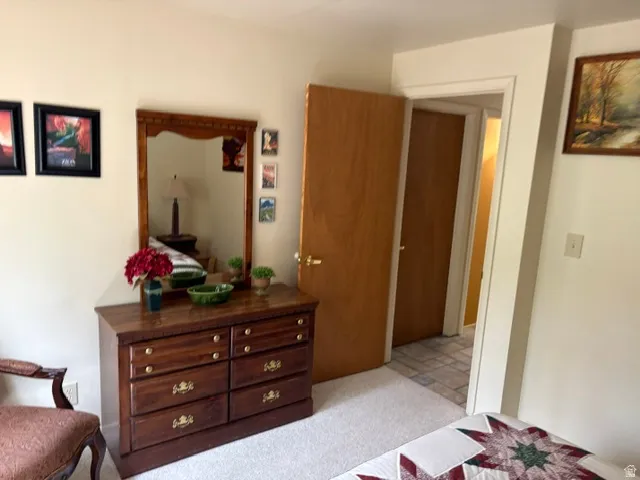 2nd main level bedroom dresser and chair