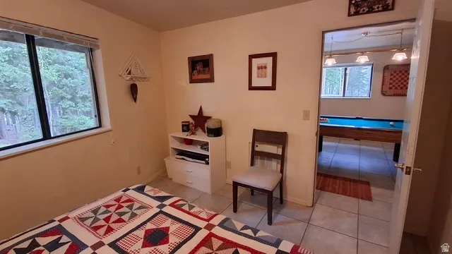Ground level bedroom looking out to rec room