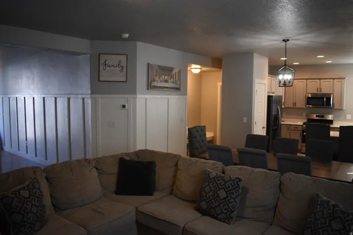 Open-concept interior featuring board and batten wall detailing