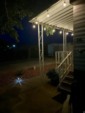 Covered porch with decorative string lighting