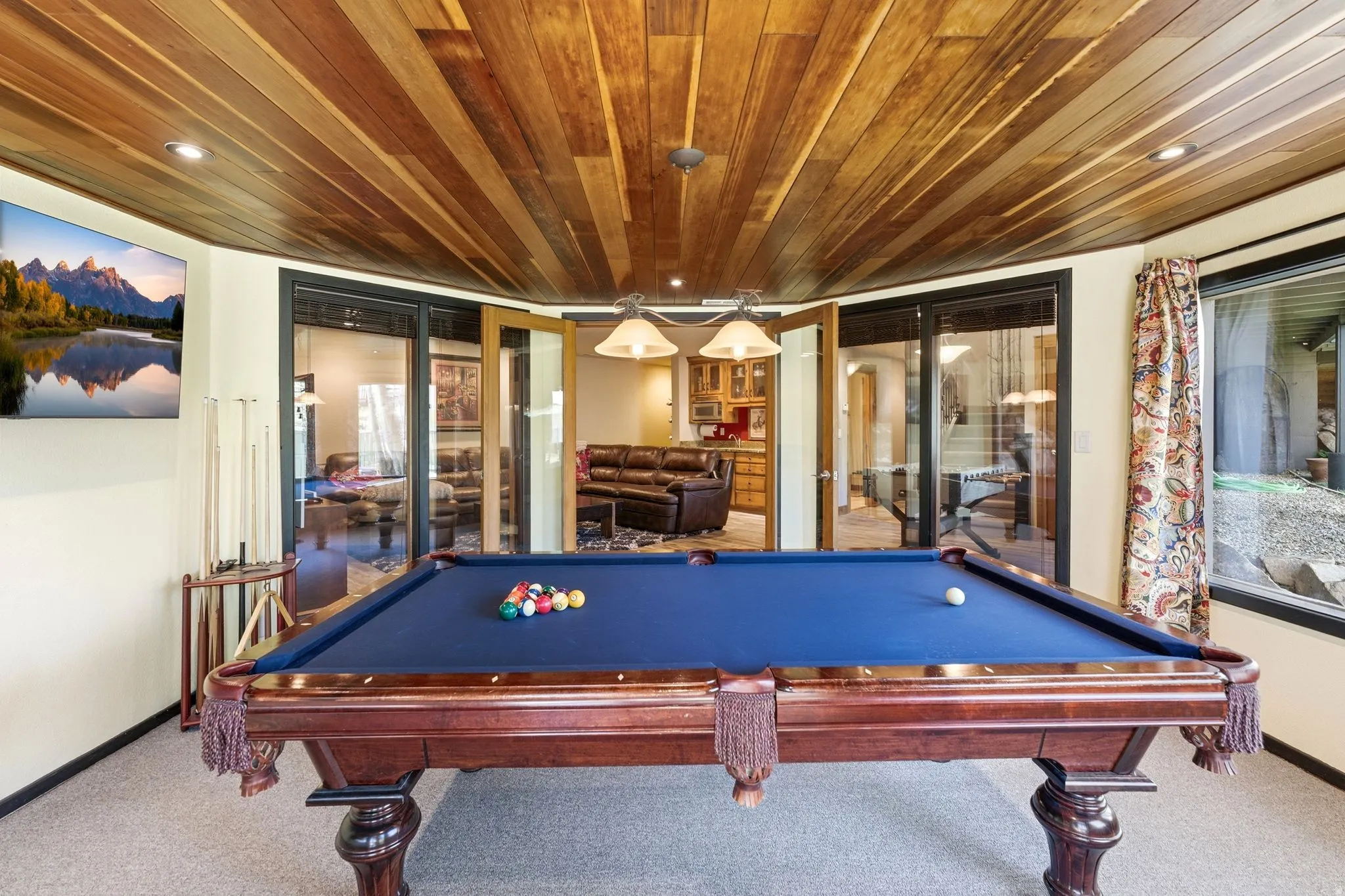Recreation room featuring a wood-panel ceiling, recessed lighting, and a billiard table