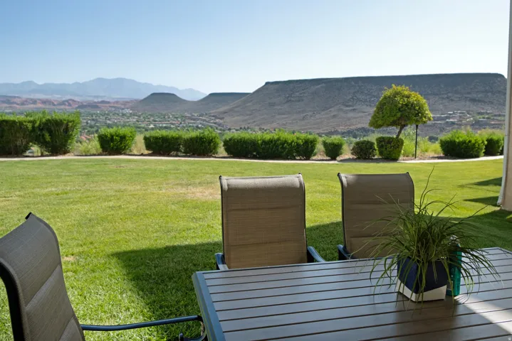 Expansive manicured lawn with low-lying perimeter shrubs