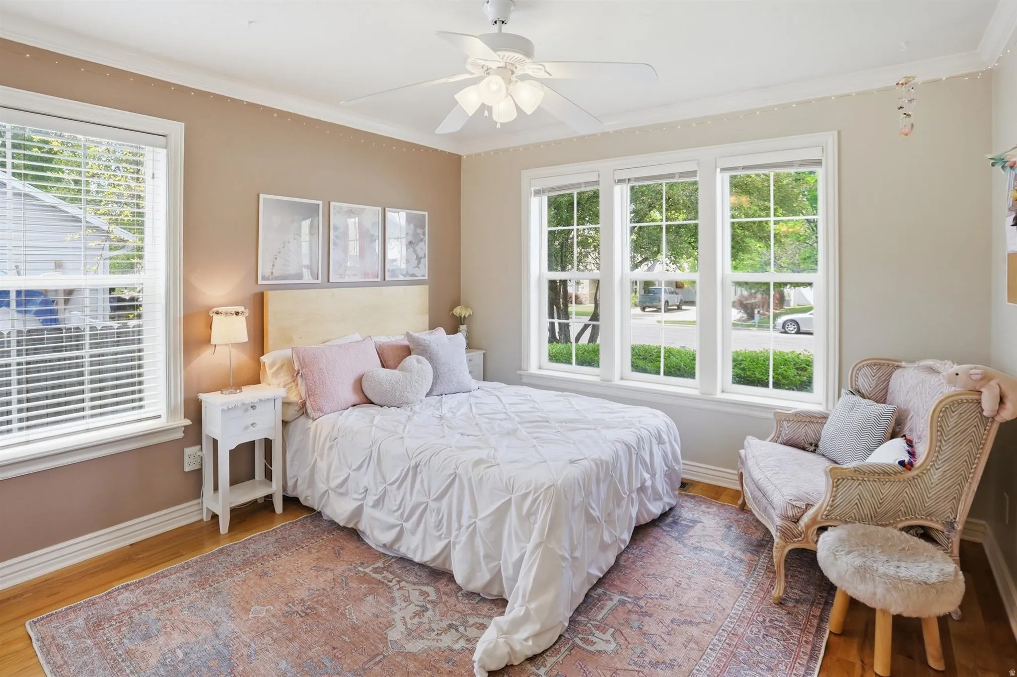 Hardwood flooring complemented by a ceiling fan