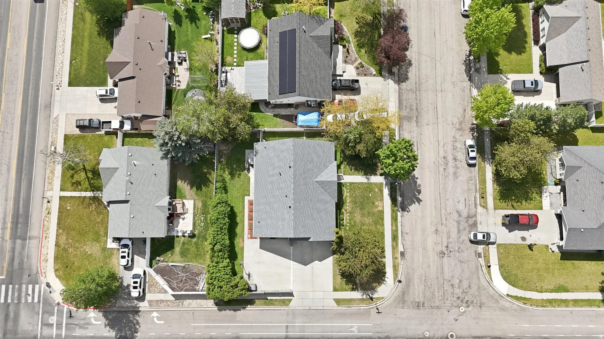 Aerial perspective highlighting a residential street and surrounding properties